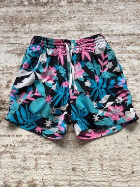 Chubbies Black/Pink/White/Blue Swim Shorts with Tropical Print. Size: S - 5.5ins